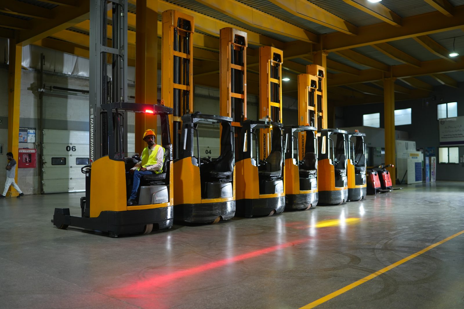 Battery operated reach truck fleet at a Connect Logistics warehouse in Karachi